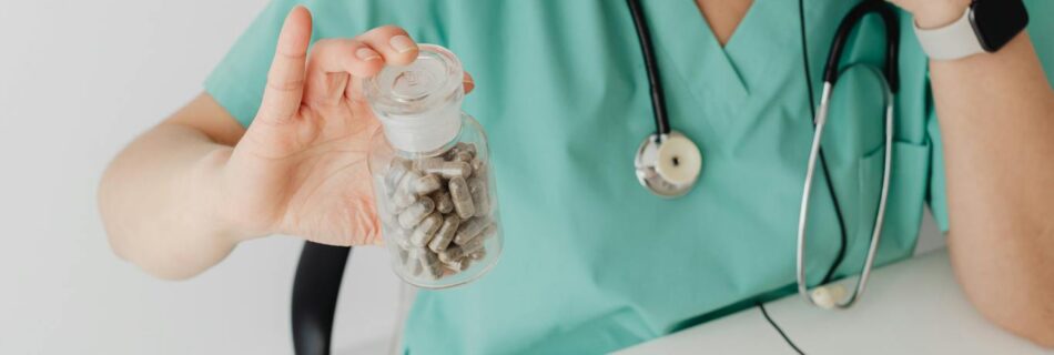 Healthcare practitioner discusses medication in an online consultation, showcasing telemedicine.